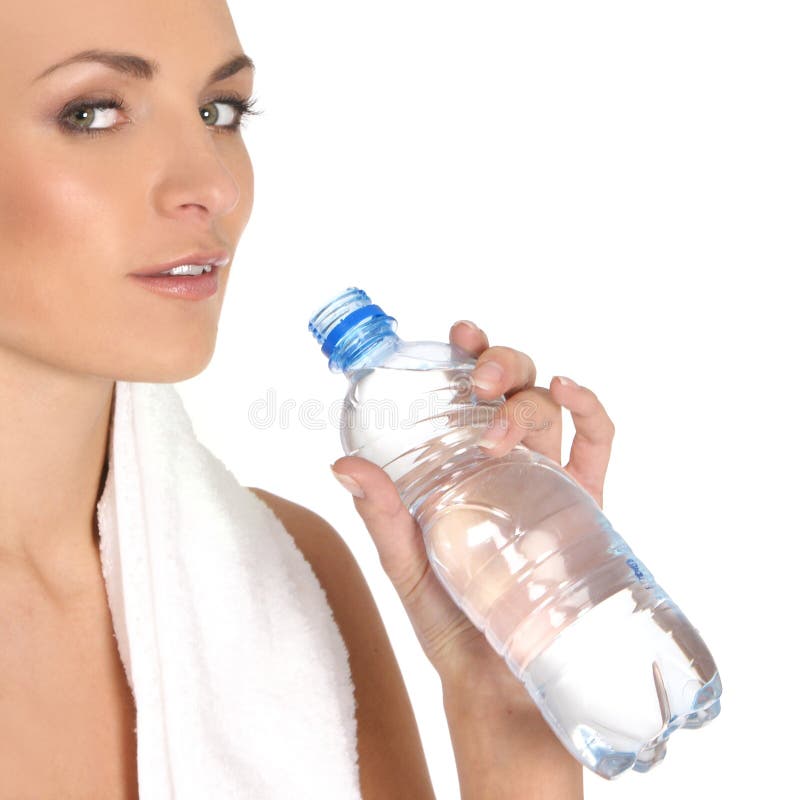 A young female is drinking refreshing water