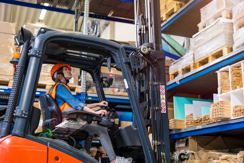 Young Female Forklift Driver Working in a Warehouse Stock Image Image