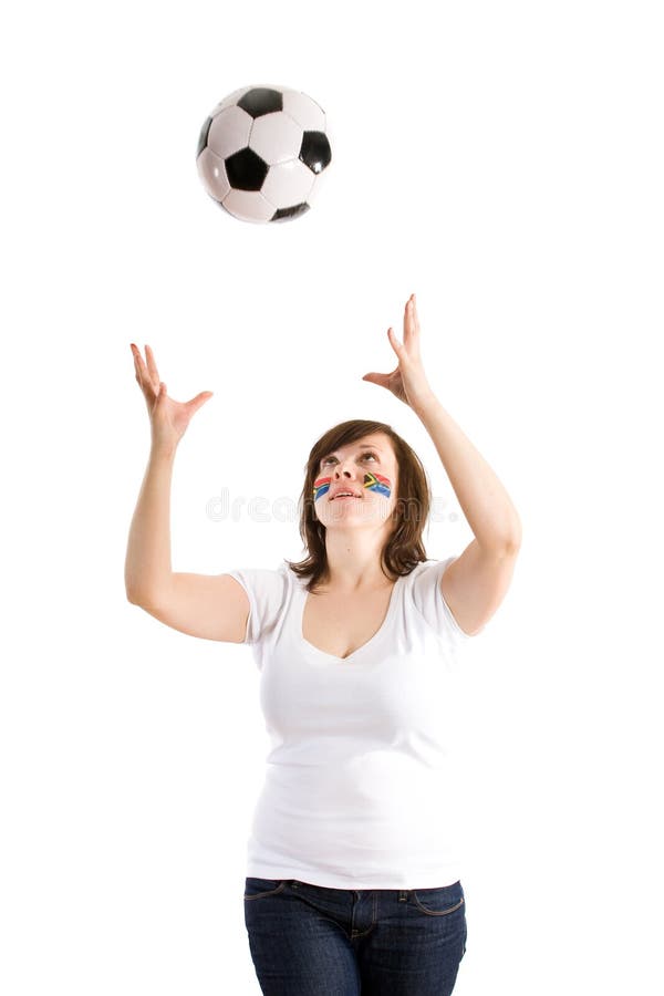 Young female playign with football ball, isolated