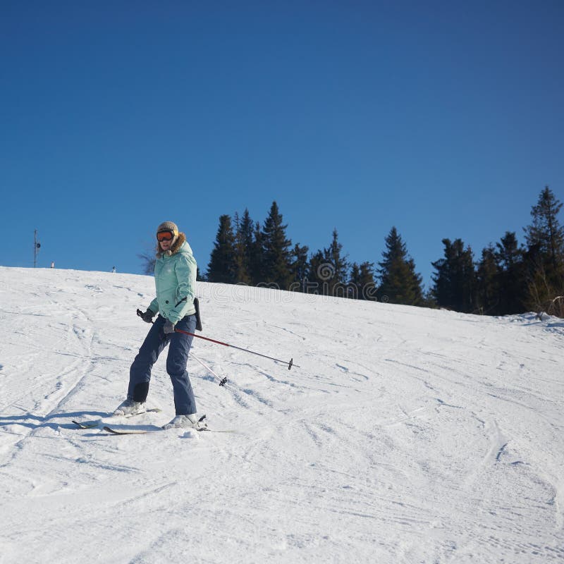 The Young Female Skier in Downhill Slope. Stock Photo - Image of ...