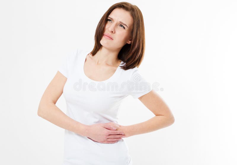 Young female touching her left side in pain. Kidney inflammation and therapy. Medicine and health care concept . Suffering woman royalty free stock photography Young female touching her left side in pain. Kidney inflammation and therapy. Medicine and health care concept . Suffering woman royalty free stock photography