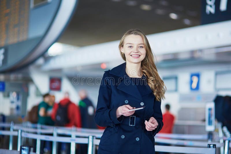 Young female traveler in international airport