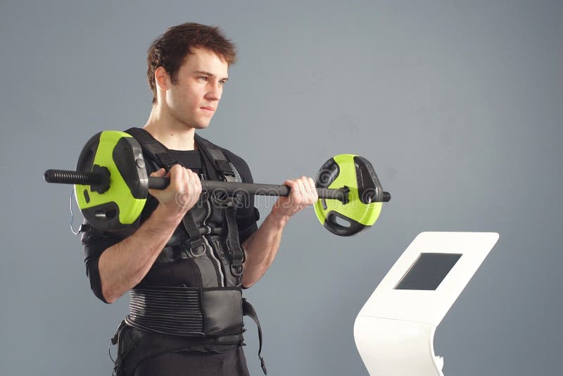 Young Fit Man Wearing Electrostimulation Suit Working Out EMS Training