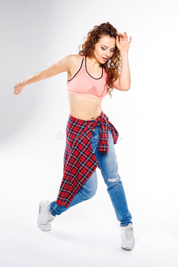 Young fitness girl dancing zumba isolated on white stock photography Young fitness girl dancing zumba isolated on white stock photography
