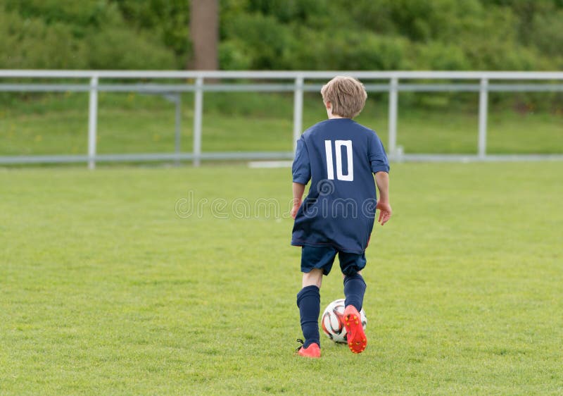 Young football player stock image. Image of techniques 46889489