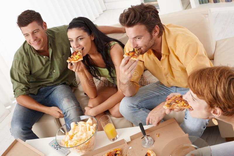 Three Friends Eating Pizza Stock Photo, Picture and Royalty Free Image.  Image 10735477.