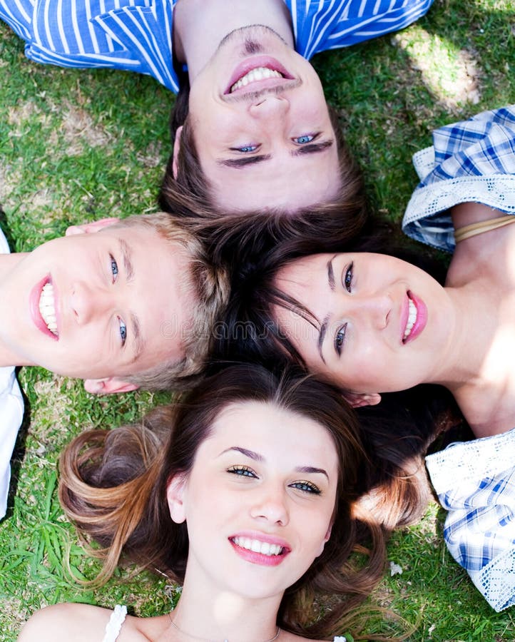 Young friends forming a circle