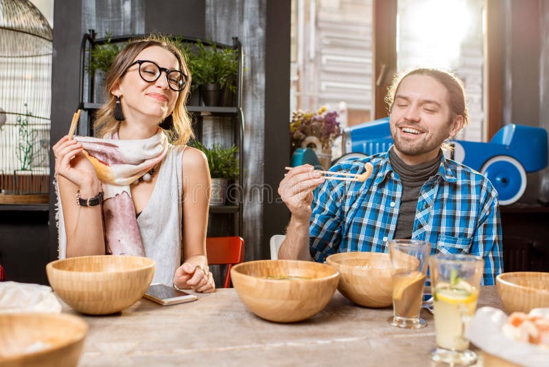 Friends Eating Asian Meals At The Restaurant Stock Photo Image O