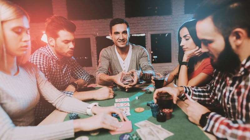 Young Friends Playing Poker on Party at Home Stock Image - Image of indoors, gaming: 135659721