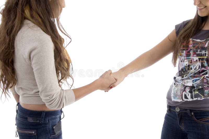 Young Friends Shaking Hands Stock Image Image of pretty, people 7128925
