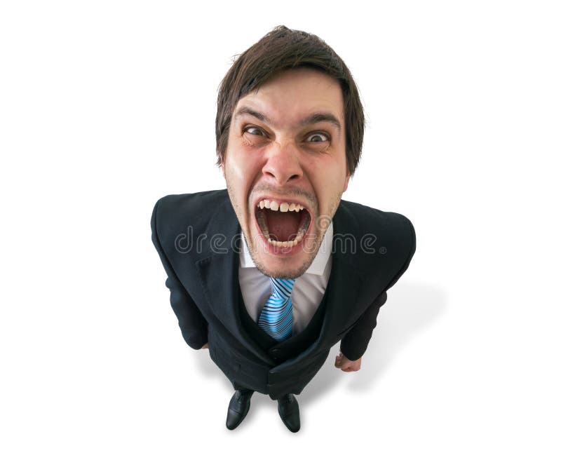 Young funny crazy businessman or boss is shouting. Isolated on white. stock image
