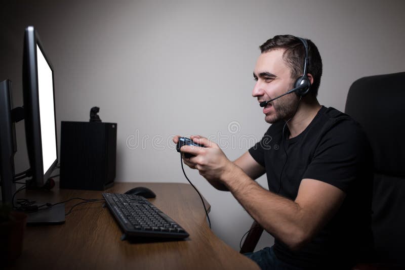 Excited Girl Gamer Sitting at the Table, Playing Online Games Stock Image -  Image of headset, esports: 136171701