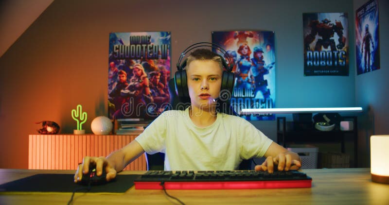 Young Gamer Headset Plays Virtual Online Video Game Using Wireless Stock  Photo by ©EvgeniyShkolenko 664461506