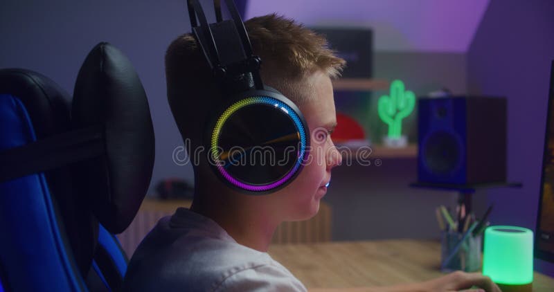 Young Gamer Headset Plays Virtual Online Video Game Using Wireless Stock  Photo by ©EvgeniyShkolenko 664461506