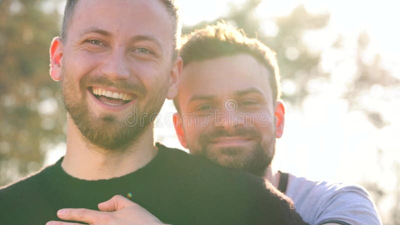 Young Gay Couple Having Fun at Sunset Outdoors Stock Footage - Video of joyful, life: 114967052