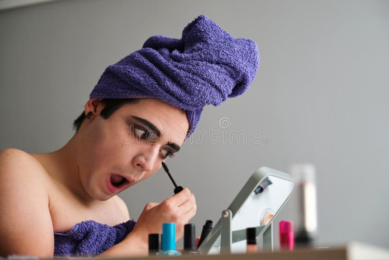 Young Gender Fluid Person Applying Eye Mascara Stock Image Image of Young Gender Fluid Person Applying Eye Mascara Stock Image Image of