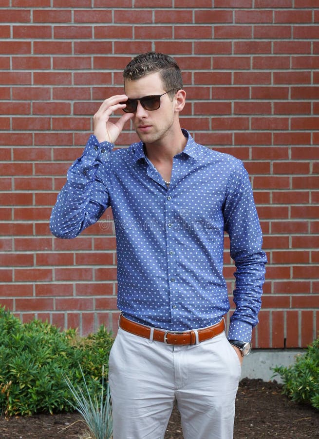 Young Gentleman Putting on His Sunglasses Stock Image - Image of ...