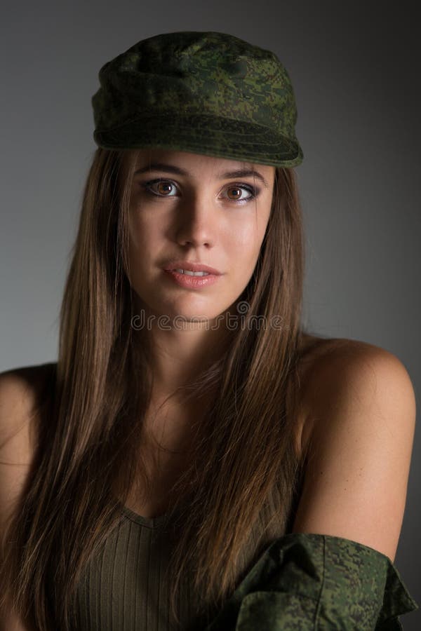 Young girl in army uniform stock image. Image of armed 129465089