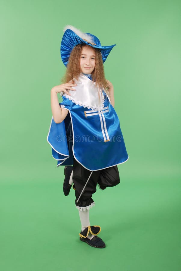 Young girl as a musketeer in blue costume with lovely blue hat with feather...