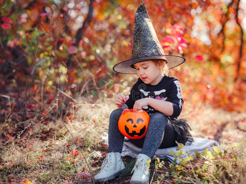 Young Girl in Black Costume Goes Trick or Treating Stock Image - Image ...