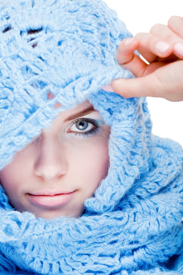 Young girl in blue wool scarf