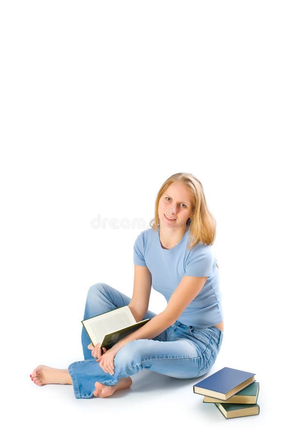 Young girl with books isolated on white