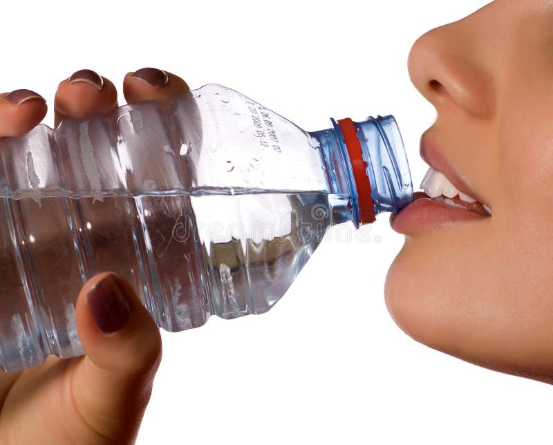 Young girl with bottle of mineral water