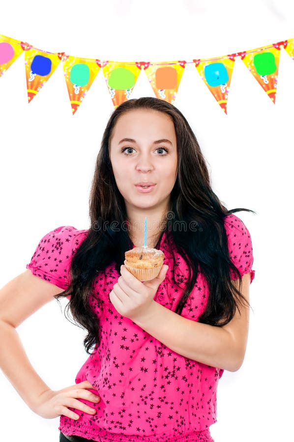 Young Girl with Cake in Hand on a White Background Stock Photo Image