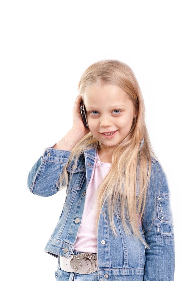 Young girl on cell phone royalty free stock photos
