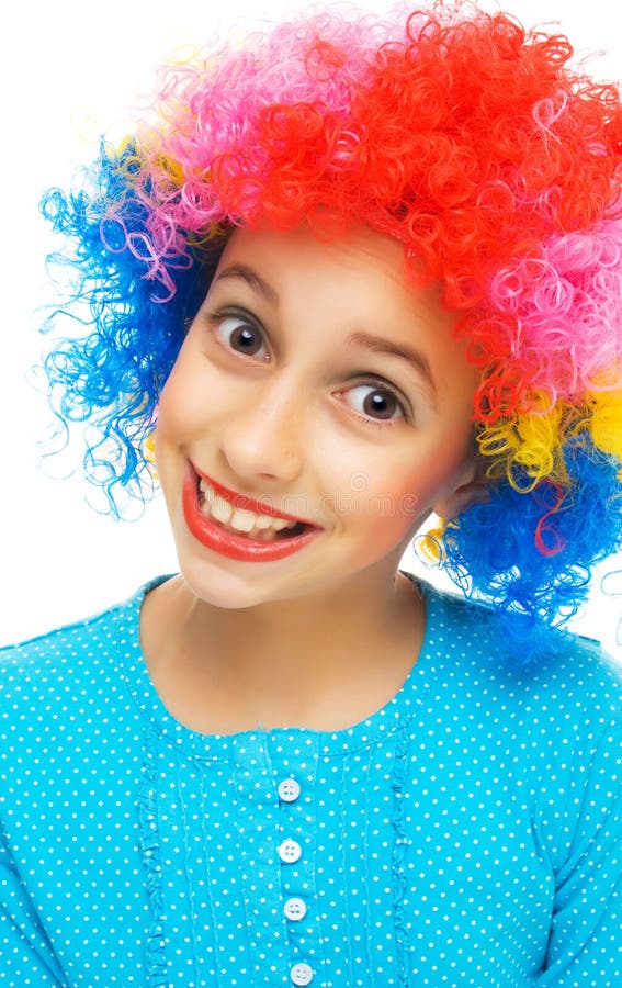 Young girl with colorful party wig