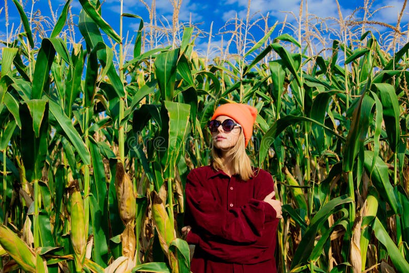 Young girl in cornfield stock image. Image of sunglasses 124532925