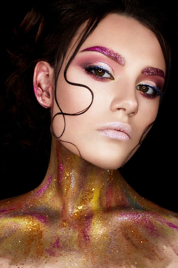 A Young Girl with Creative Makeup and Shiny Eyebrows. Beautiful Model ...