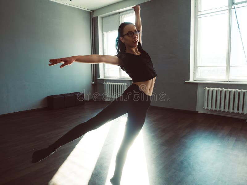 Young girl dancing contemp. Dynamic shot in the jump. stock photo Young girl dancing contemp. Dynamic shot in the jump. stock photo