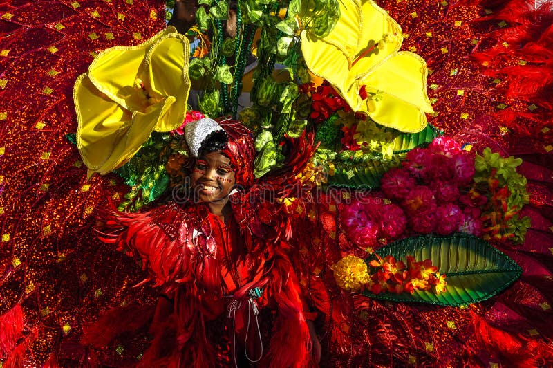 A young girl depicts the rich flora and fauna in Trinidad and Tobago stock photography