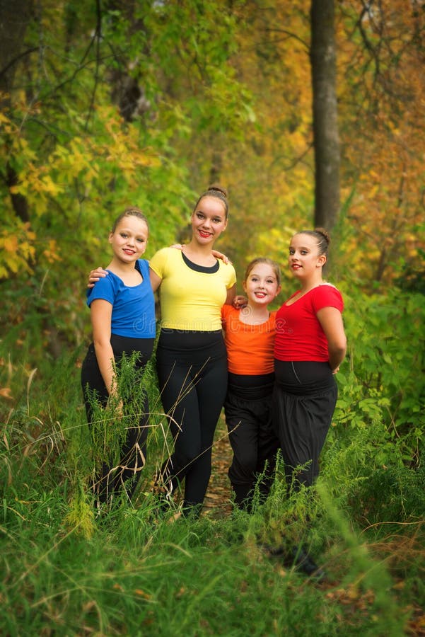 Young Girl Friends in the Forest in Autumn royalty free stock photos Young Girl Friends in the Forest in Autumn royalty free stock photos