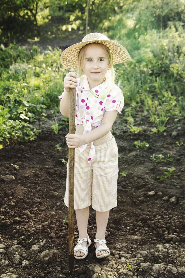 Young girl in the garden stock image. Image of nature - 31346655