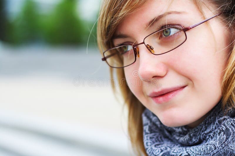 The young girl in glasses