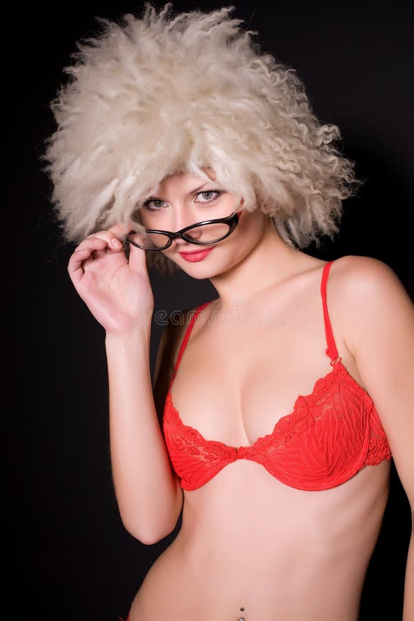 Young girl in glasses and furry hat