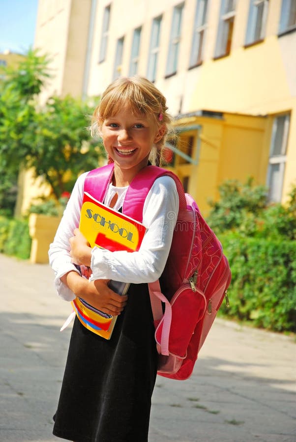 Young girl going to school stock photo. Image of book - 12746752