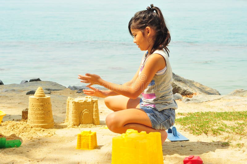 Young Girl Having Fun At The Beach