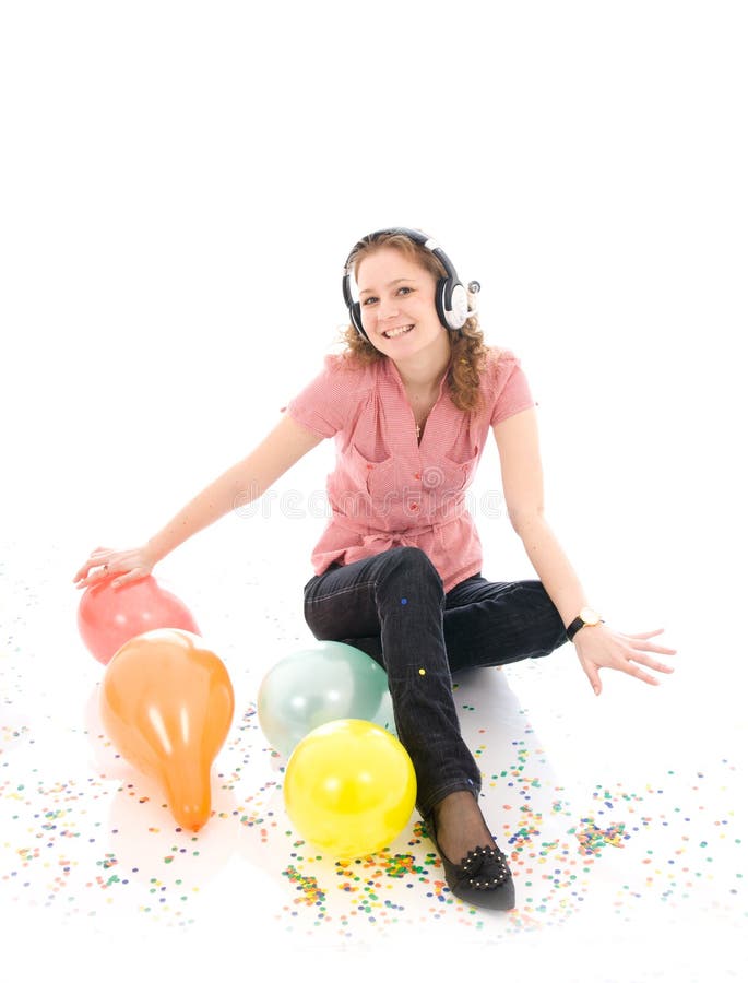 The young girl with a headphones isolated