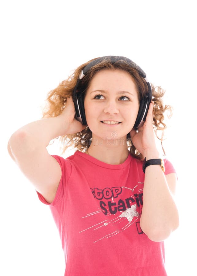 The young girl with a headphones isolated