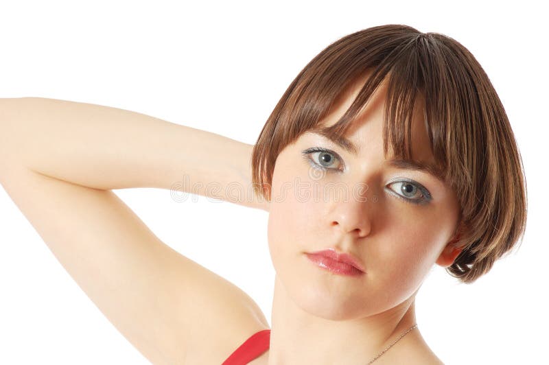 Young girl holding her hair