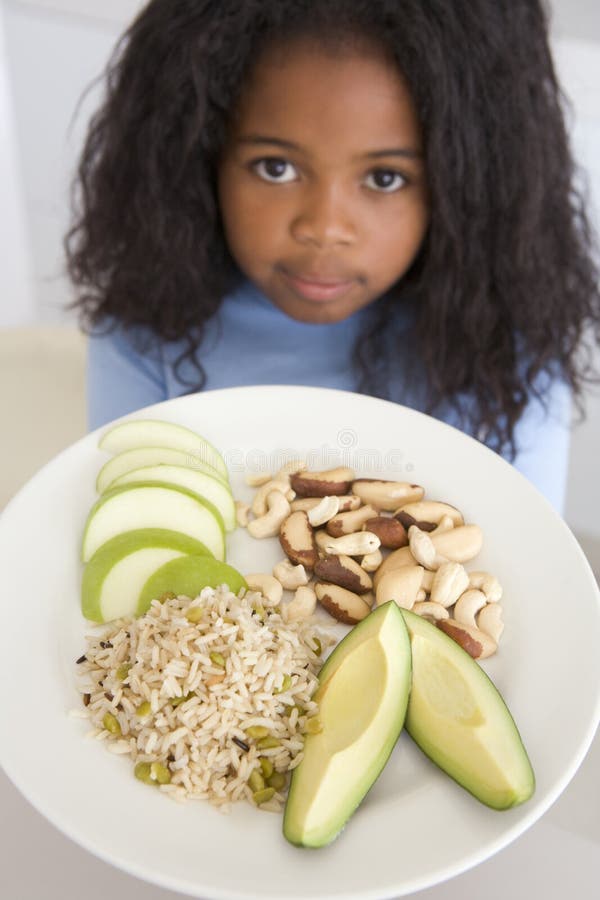 Young Girl In Kitchen Eating Rice Fruit And Nuts Royalty Free Stock Image Image 5938336