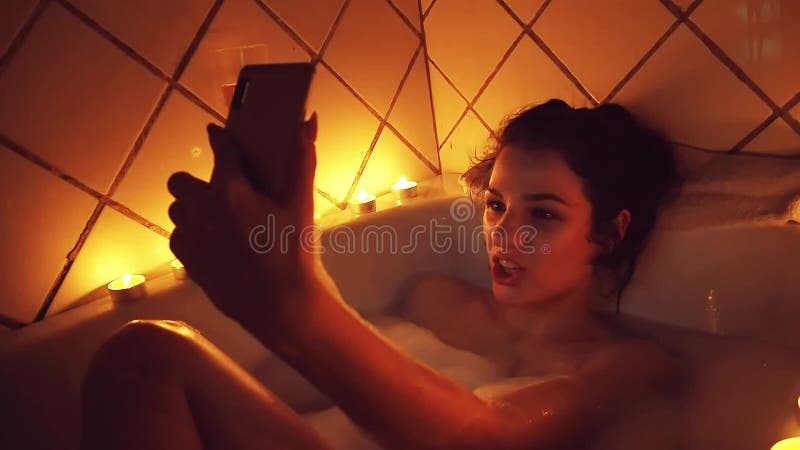 Young woman take bubble bath. Top view, Stock Video