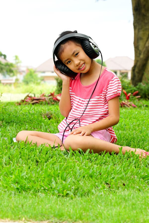 Young girl listening to music