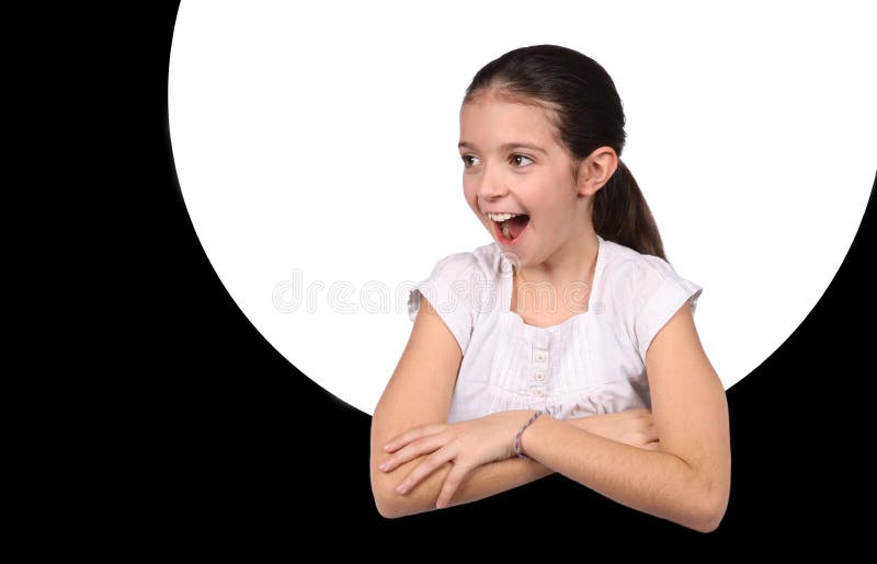 Young girl looking through a hole stock photos