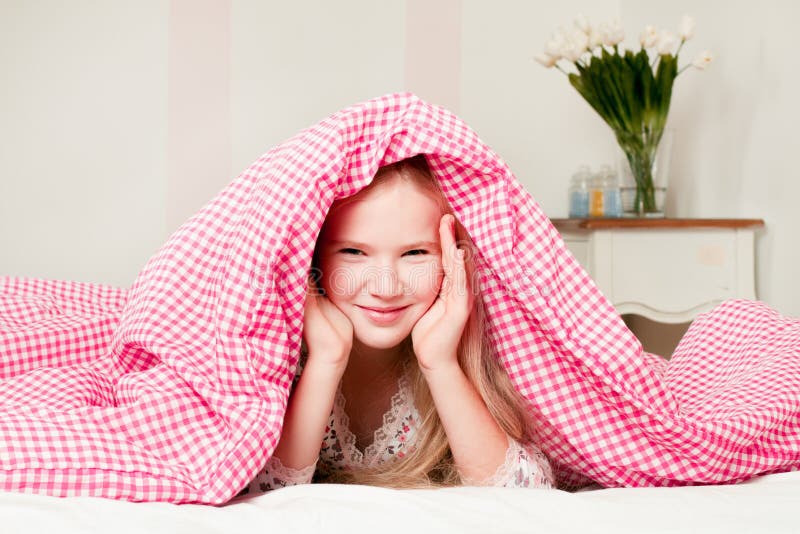 Young Girl Lying on the Bed Under the Covers Stock Photo Image of