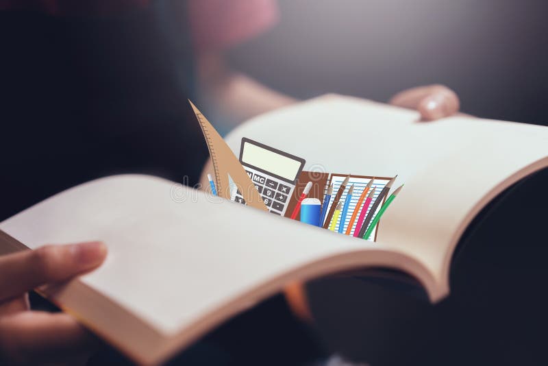 Young girl open the pages of the book empty and a stationary icon. royalty free stock image