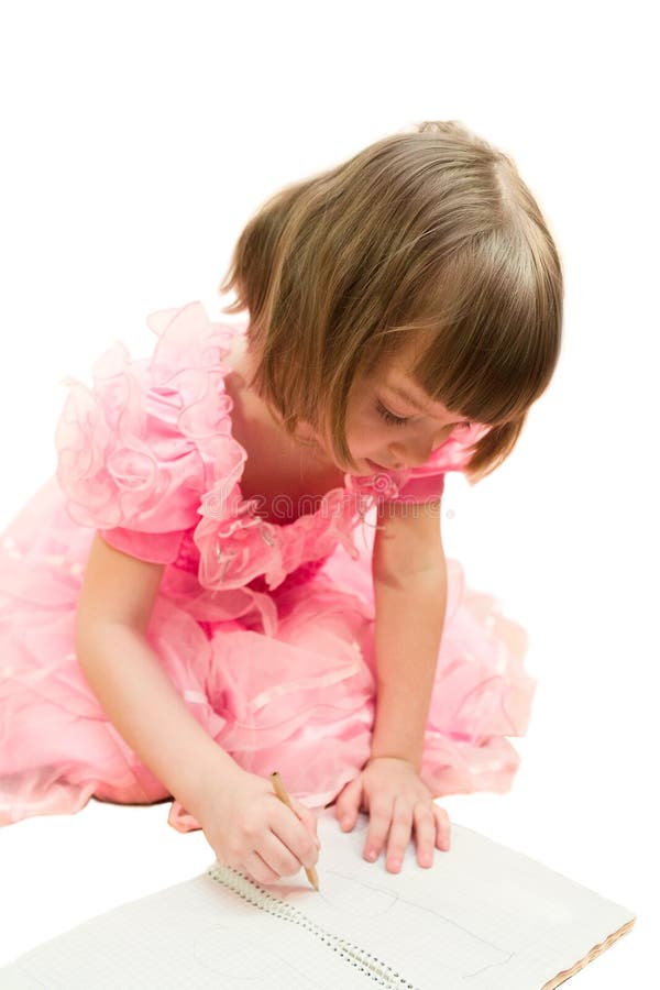 Young girl in pink draw by pencil